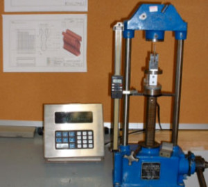 machine measuring the pull force of a spring