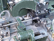 Fourslide metal stamping tooling machine
